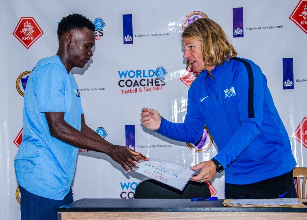 Coach Alex recieving his certificate after completion of Advanced level 2